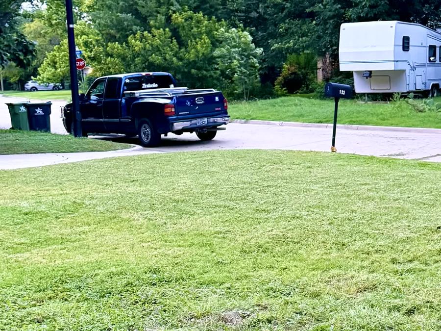Neatly mowed front lawn after service — Arlington, TX