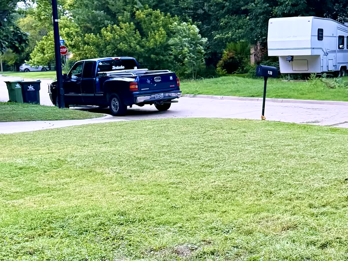Neatly mowed front lawn after service — Arlington, TX